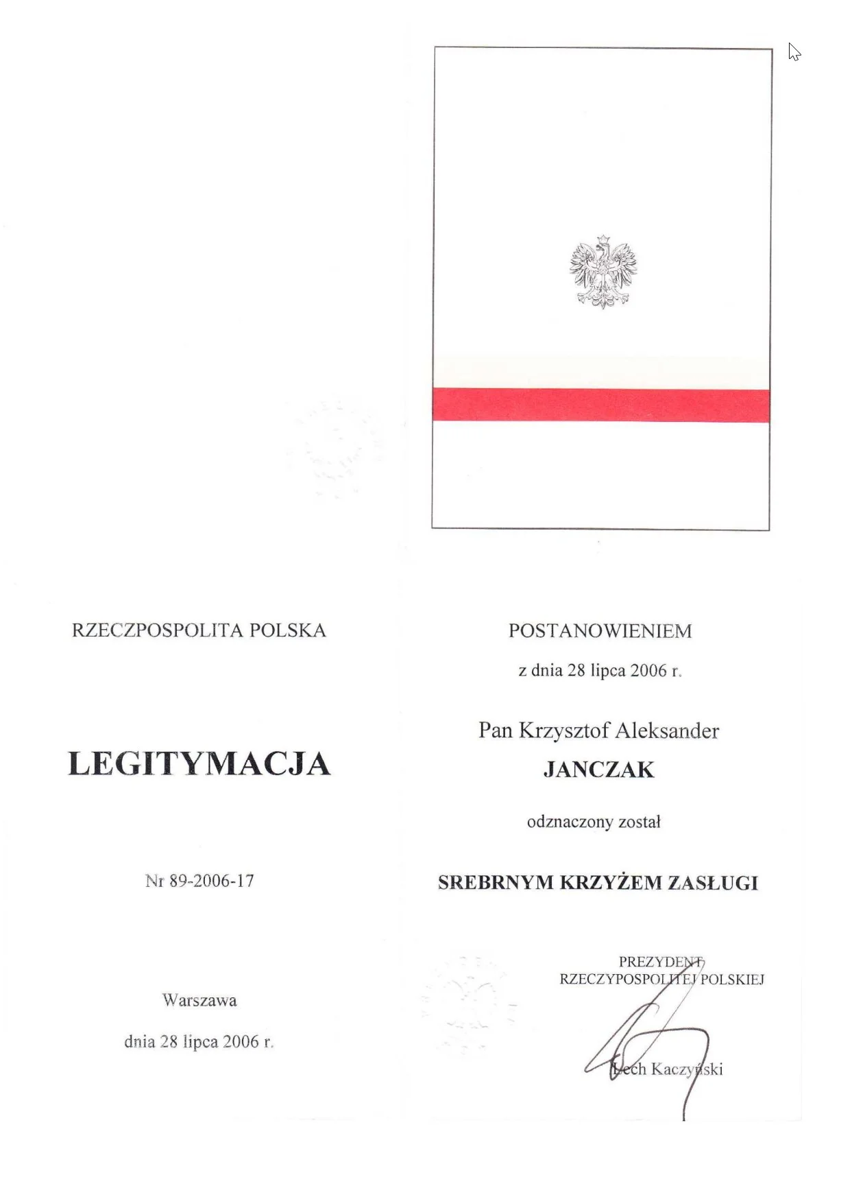 Silver Cross of Merit certificate, signed by the President of Poland