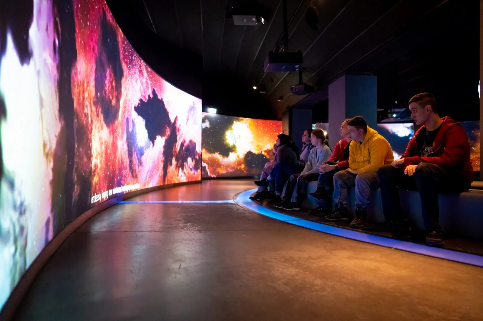 Visitors in the 360-degree Planet of Water projection room